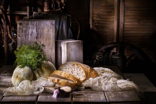 Bread and vegetables on a vintage studio background