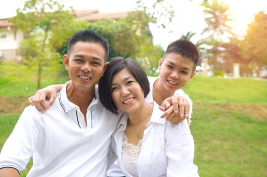 Asian Chinese Family Relaxing at outdoor park 