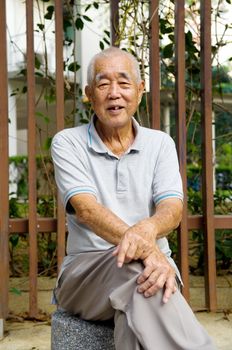 Portrait of a smiling asian senior man