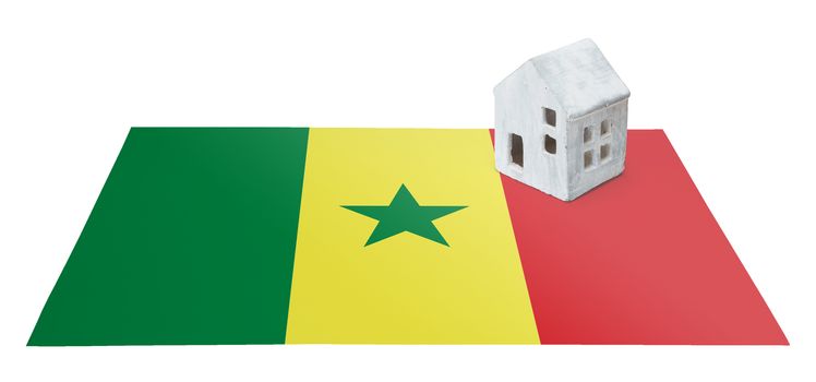 Small house on a flag - Living or migrating to Senegal