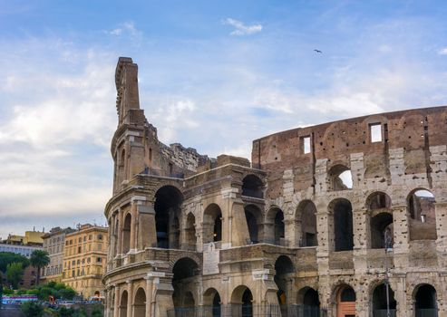 view on the Great Roman Colosseum Coliseum, Colosseo ,also known as the Flavian Amphitheatre. Famous world landmark. Scenic urban landscape. Rome. Italy. Europe