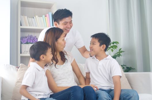 Indoor portrait of asian mixed race family