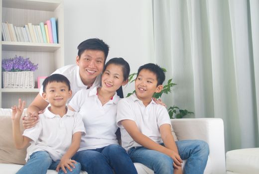 Indoor portrait of asian mixed race family