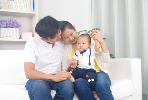 Indoor portrait of asian family