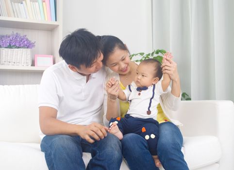 Indoor portrait of asian family