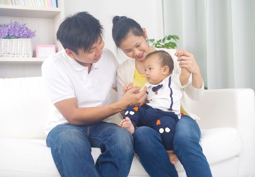 Indoor portrait of asian family