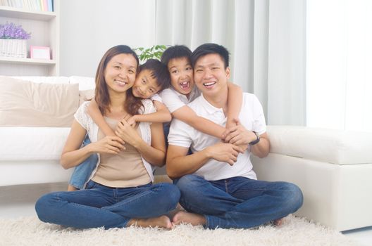 Indoor portrait of asian mixed race family