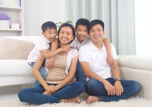 Indoor portrait of asian mixed race family