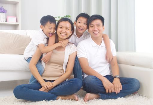 Indoor portrait of asian mixed race family