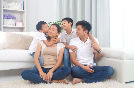 Indoor portrait of asian mixed race family