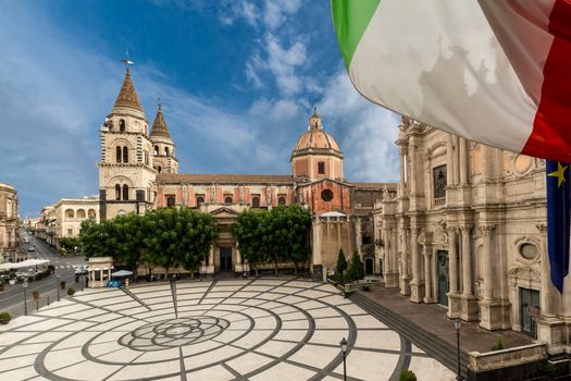 view of the main piazza of acireale with Italian flag