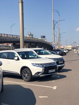 Kiev, Ukraine - April 04, 2017: Traffic in a big city on a bridge cityscape