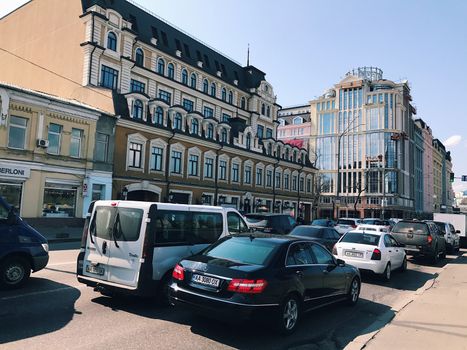 Kiev, Ukraine - April 04, 2017: Traffic in a big city on a bridge cityscape