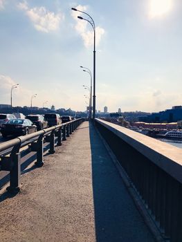 Empty road on a bridge in the big city without people