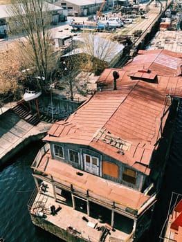 Rusty vintage abandoned ship ferry in old port