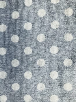 Textile fabric background. Сasual simple everyday dotted polka clothers