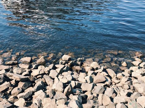 Beach of river with cool stones in the spring