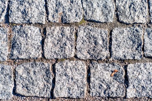 Close up of abstract background texture of paving stone