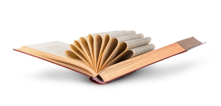 Ajar old book with curled pages isolated on white background