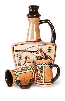 Ancient Wine Jug And Ceramic Mugs Isolated On White Background