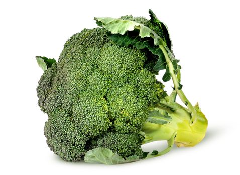 Big broccoli florets with leaves rotated isolated on white background