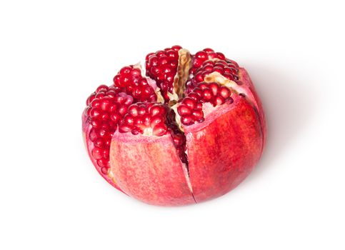 Broken Bright Ripe Delicious Juicy Pomegranate Top View Rotated Isolated On White Background