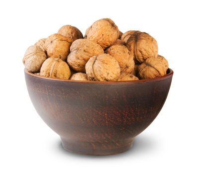 Clay Bowl Full Of Walnuts Isolated On White Background