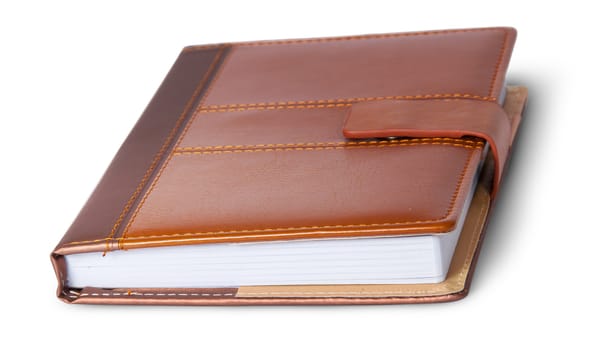 Closed notebook in leather cover rotated isolated on white background
