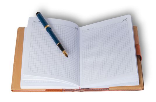 Fountain pen on top of a notebook isolated on white background