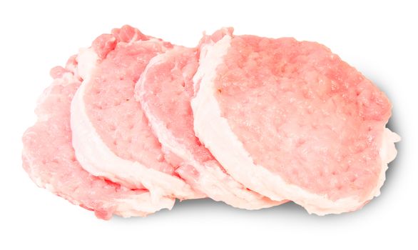 Four Raw Pork Schnitzels Isolated On White Background