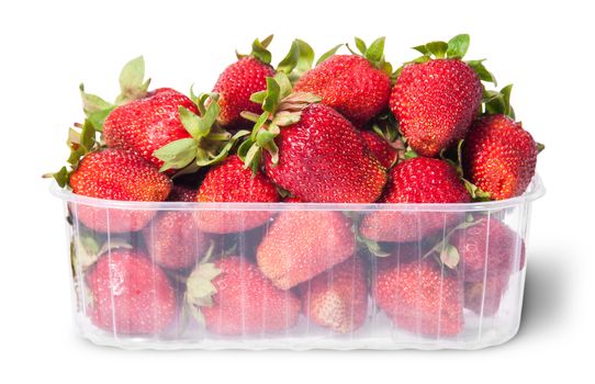 Freshly strawberries in a plastic tray isolated on white background