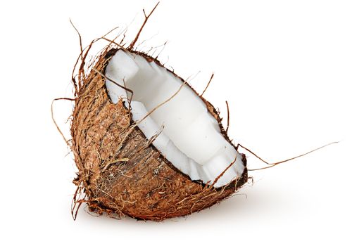 Half coconut rotated isolated on white background