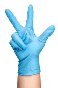 Hand in blue latex glove showing three fingers vertically isolated on white background
