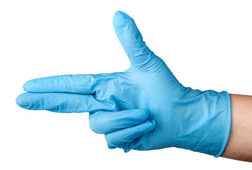 Hand in blue latex glove fingers pistol isolated on white background