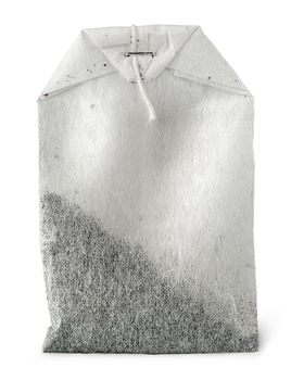 In front single tea bag with thread isolated on white background