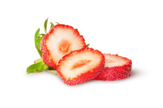 Juicy ripe strawberries sliced isolated on white background