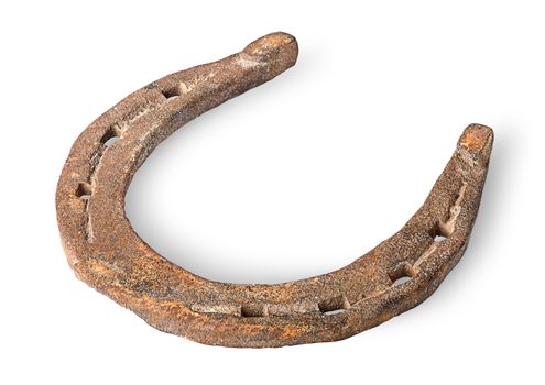 Old rusty horseshoe horizontally isolated on white background