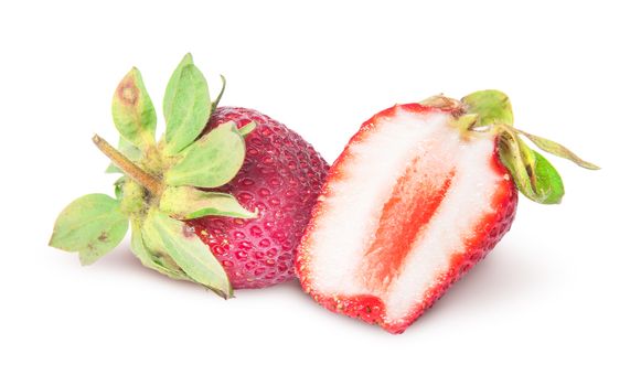 One whole and half juicy strawberries isolated on white background