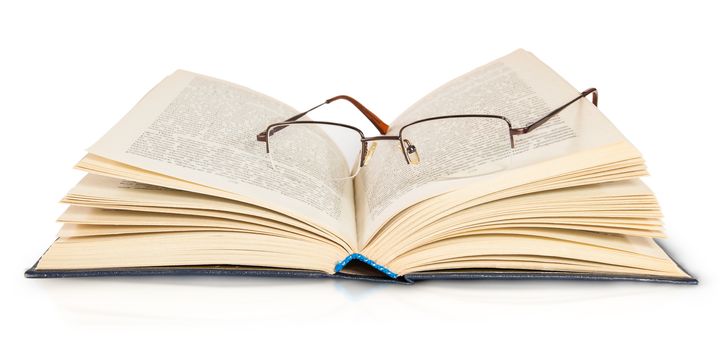 Opened Book And Glasses Isolated On White Background