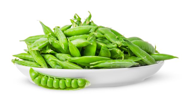 Opening and closing pea pods on white plate isolated on white background