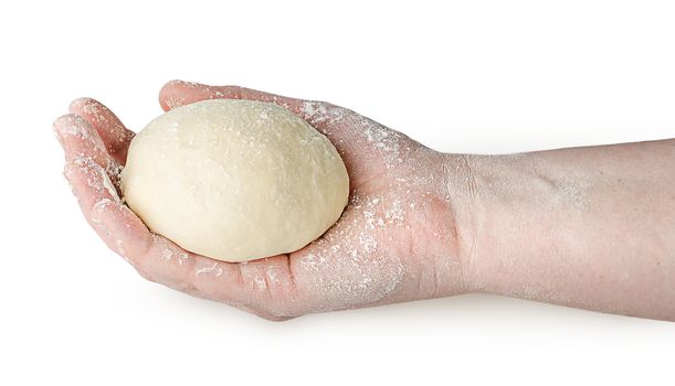 Piece of dough in human hand isolated on white background