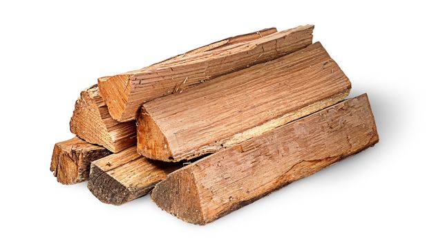 Pile of firewood rotated isolated on white background