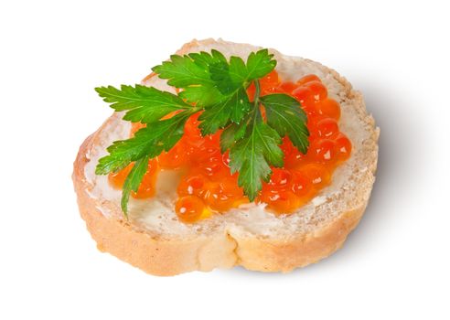 Red caviar on the bread and butter isolated on white background