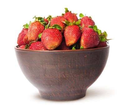 Ripe juicy strawberries in a ceramic bowl isolated on white background