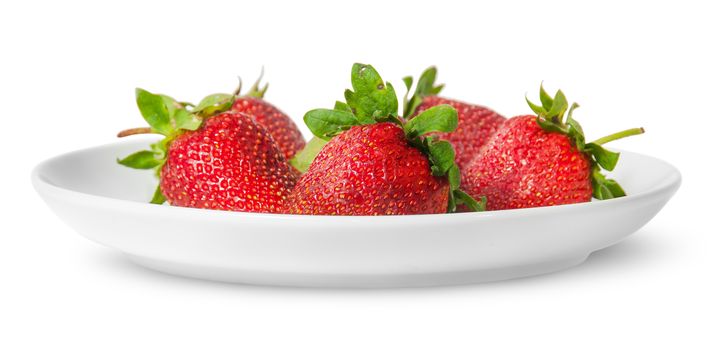 Several pieces of strawberry on white plate isolated on white background