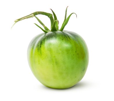 Single green tomato isolated on white background