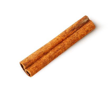 Single cinnamon sticks isolated on white background