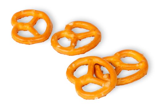 Some crunchy pretzels with salt isolated on white background