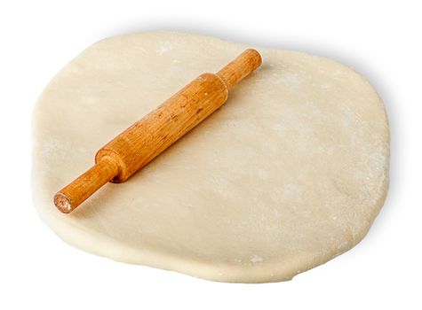 Small wooden rolling pin to rolled dough isolated on white background