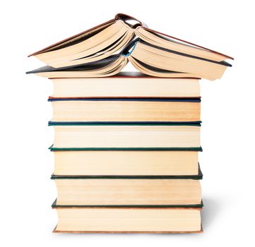 Stack of six old books with two open top isolated on white background